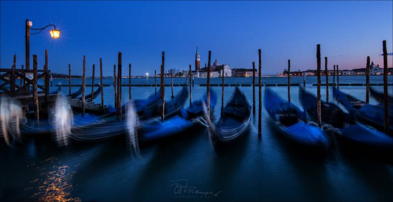 Swaying gondolas of Venice with St. Giorgio Maggiore