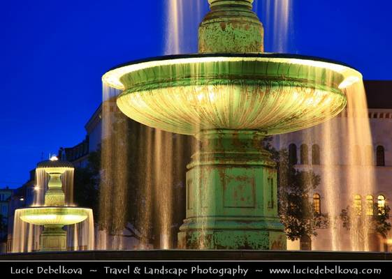 Germany - Bavaria - Munich - Illuminated University fountain at Dusk - Blue Hour - Twilight - Night