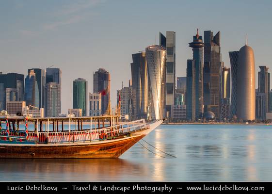 Qatar - Doha - Modern Skyline with Sky High Skyscrapers along the Corniche and traditional Dhow