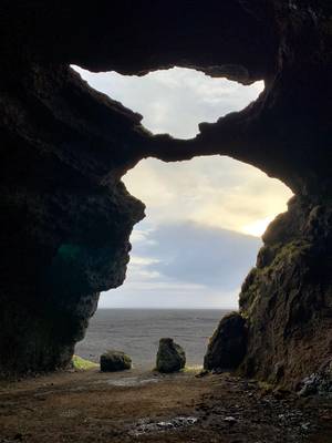 ‪View from inside the “Yoda” cave in the Hjörleifshöfði cape
