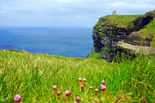 On the edge of the Cliffs of Moher, Ireland