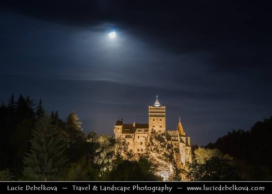 Romania - Transylvania - Dracula's Castle at night during setting Full Moon