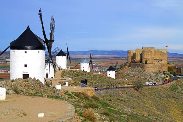 Scenic row of windmills & the castle, Consuegra, Spain
