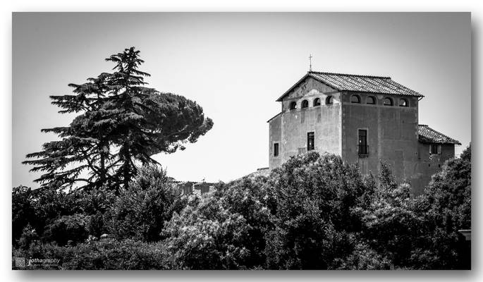 Vintage roman church near Colosseum in Rome / Rom / Roma