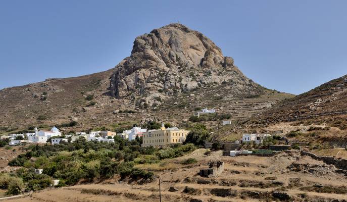 The imposing mountain Exobourgo and the village Xinara in Tinos