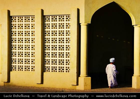 Oman - Nizwa - Young boy walking through old souq