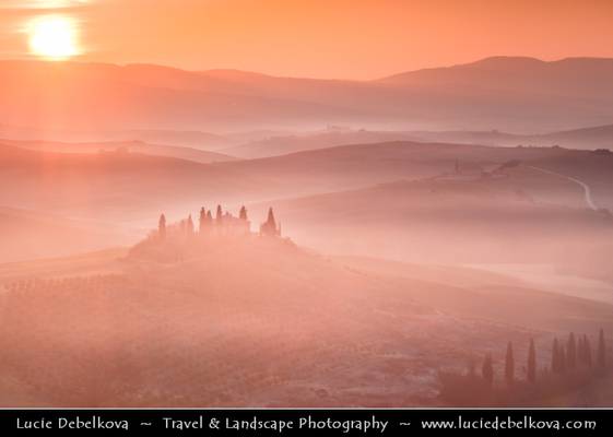 Italy - Tuscany - Iconic Belveder in Val d'Orcia in the morning mist during sunrise