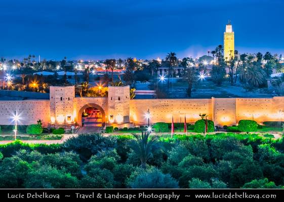 Morocco - Marrakech - UNESCO -  Iconic Minater of Koutoubia Mosque and historical city walls at Dusk - Twilight - Blue Hour - Night