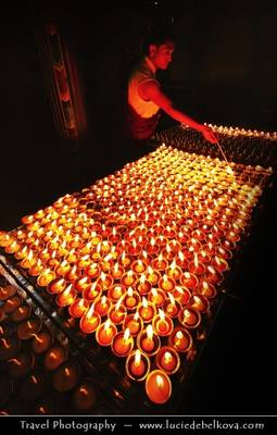 Nepal - Burning Butter Lamps at Swayambhunath Temple