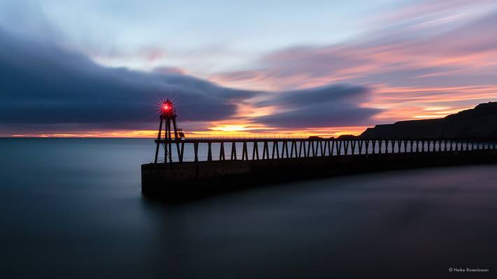 Whitby pier at dawn