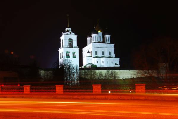 Pskov by night. Night traffic in front of the Cathedral