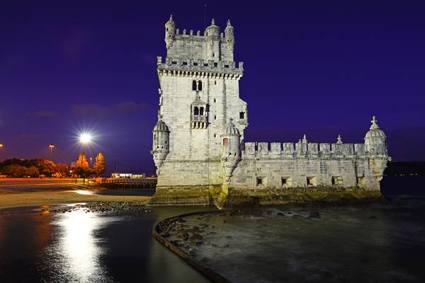 Lisbon by night. Majestic Belém Tower on Tagus River