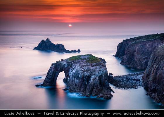 UK - England - Cornwall - Land's End - Iconic rocky arch at Sunset