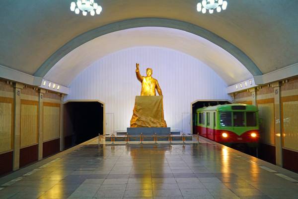 Golden statue of young Kim Il Sung at Kaeson metro station, Pyongyang