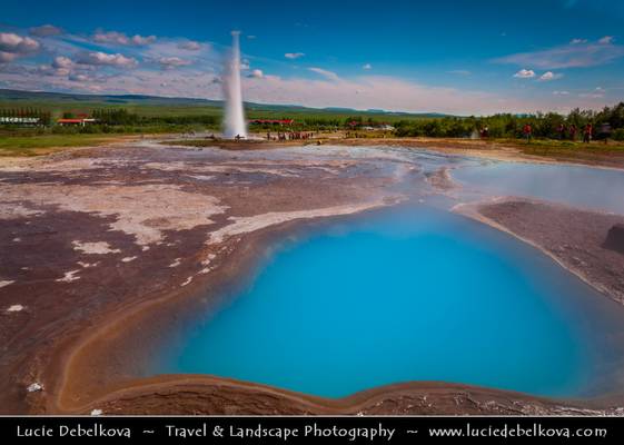 Iceland - Turquise Pool with Strokkur in the Background