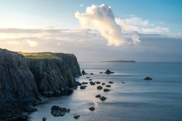 Cliffs, Rocks and a Cloud