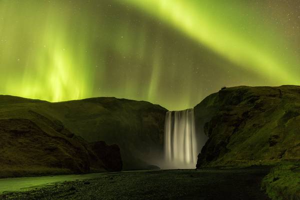 kp5 Aurora Borealis over the 200ft Skogafoss Waterfall, Iceland