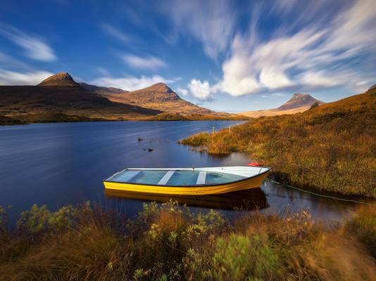 Rowing boat at Loch Lurgainn in the gorgeous region of Assynt, Scotland