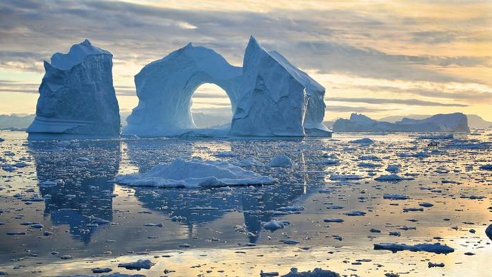 Fishing between icebergs in the midnight sun, Greenland, by Michael Schwab [3422x1926]