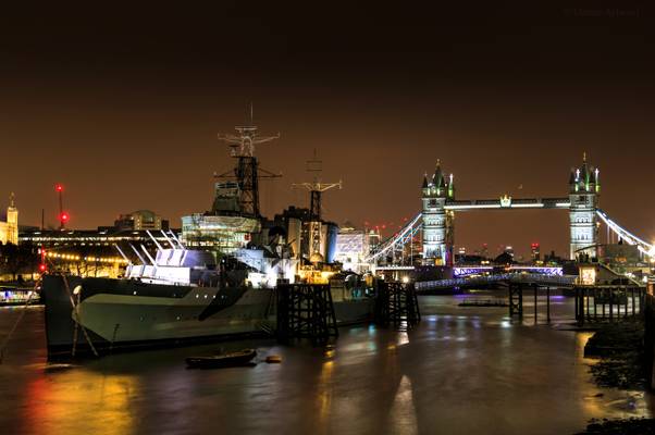HMS Belfast on the Thames in front of Tower Bridge, London