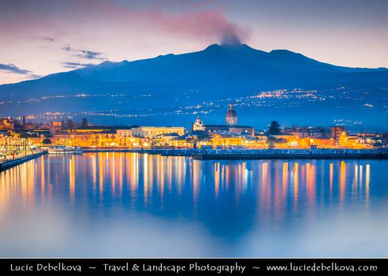 Italy - Sicily - Riposto fishing town under active Etna Volcano at Twilight - Dusk - Blue Hour