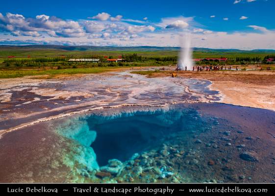 Iceland - Window into the Earth - Pool with Strokkur in the Background
