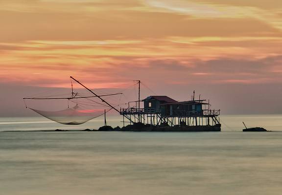 Fishing hut (Trabucco) at Marina di Pisa during golden hour