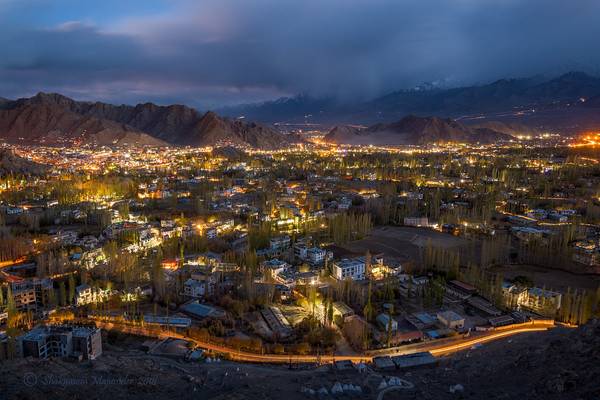 The illuminated Leh city at twilight