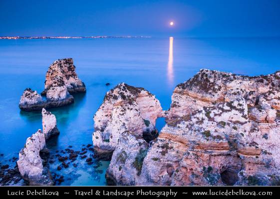 Portugal - Moon Rise over Cliffs at Ponta da Piedade (Piety Point) near Lagos - Algarve