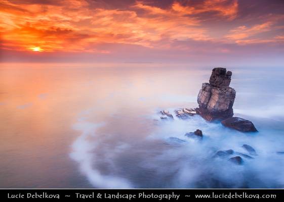 Portugal - Standing Alone under Monet like Sky- Sunset at Cliffs in Cabo Carvoeiro at Peniche