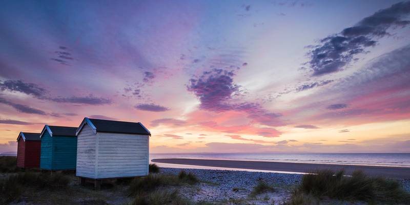 Same Huts, Different Sky