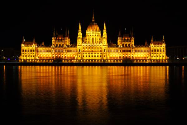 Budapest by night. Iconic view of Hungarian Parliament