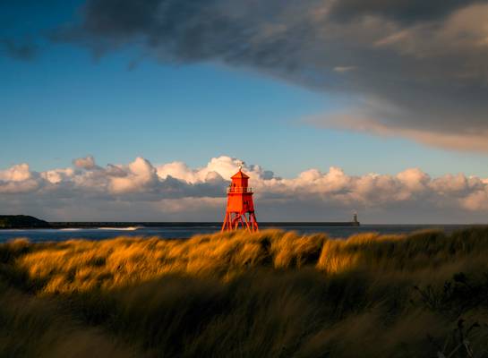 The little red rocket also know as The Herd Groyne Lighthouse.