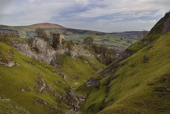 Peveril Castle above the imposing cliffs of Cave Dale
