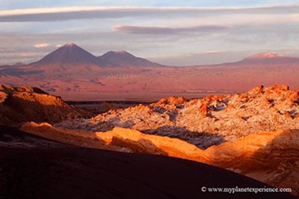 Valle de la Luna and Licancabur Volcano at sunset - San Pedro de Atacama, Chile