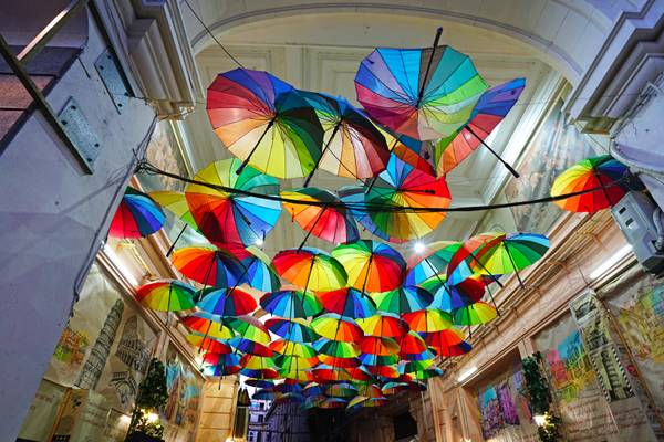 Bucharest by night. Multicolored umbrellas
