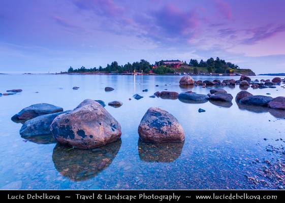 Finland - Helsinki - Helsingfors - Twilight at shores of Kaivopuisto park that borders the Gulf of Finland - Beach with lot of stones, rocks and boulders