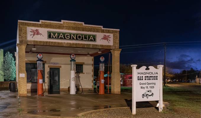 1929 Restored Station in Shamrock. Tx with storms moving off to the east