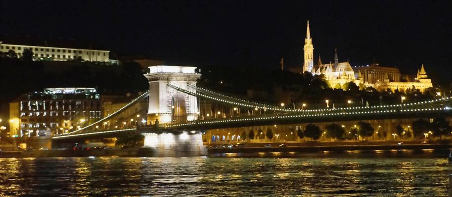 The Széchenyi Chain Bridge at night with Matthias Church in backgroundwith