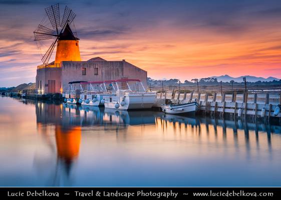 Italy - Sicily - Salina - Windmills at Stagnone di Marsala in front of Mozia Island - Salt plant in the area of Trapani