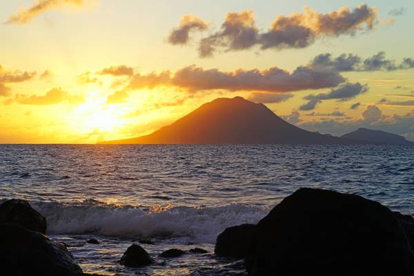 The last sunbeams from behind Sint Eustatius seen from St Kitts