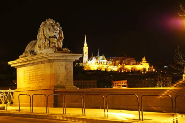 Budapest by night. Lion guardian & Matthias Church