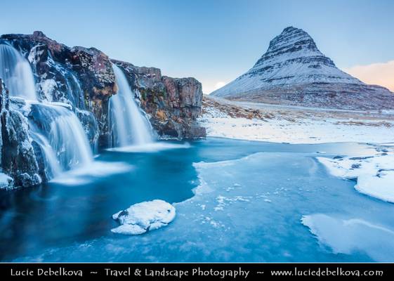Iceland - Snæfellsnes - Kirkjufell & Kirkjufellsfoss waterfall in Grundarfjörður under snow