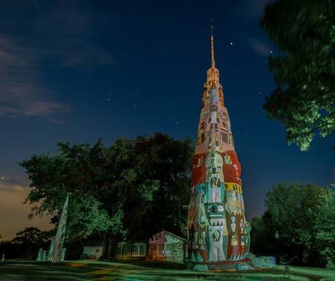 Worlds largest Totem  Pole with an almost full moon to light it