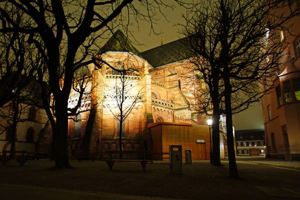 Basel by night. Minster from the riverside