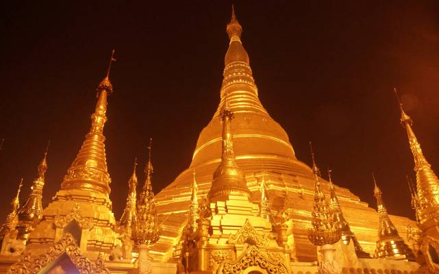 The Shwedagon Pagoda of Yangon in evening lights