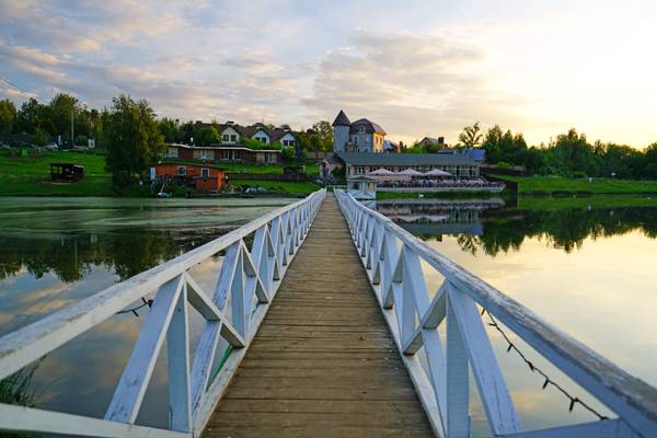 Crossing the wooden bridge, Romashkovo lake, Russia
