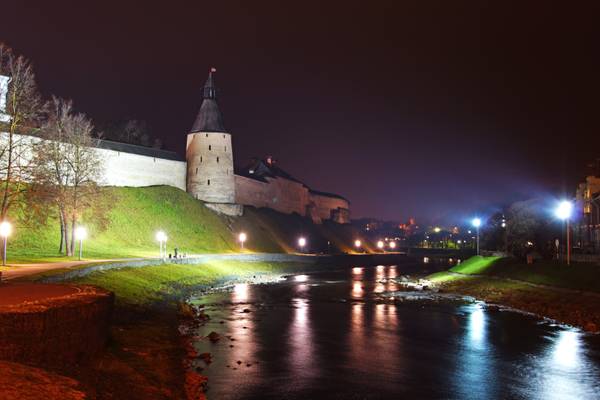 Pskov by night. Lights reflecting in Pskova river