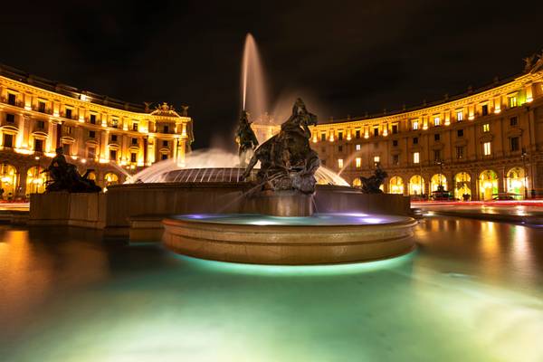 Night view of Naiads Fountain in Republic Square.