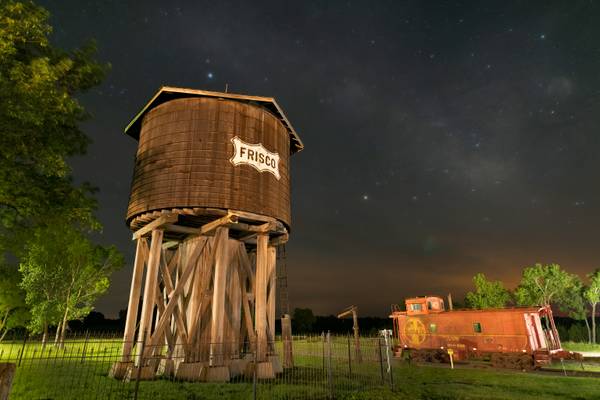 Frisco Water Tower with a cloud covered Milky Way